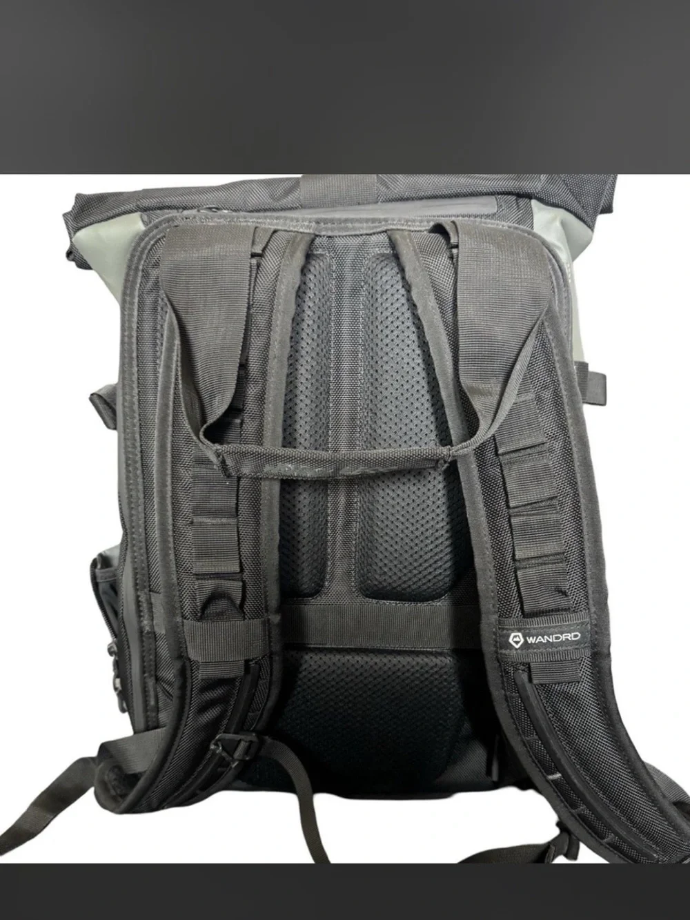 WANDRD Roll-Top Camera Backpack in Sage Green with Black Accents